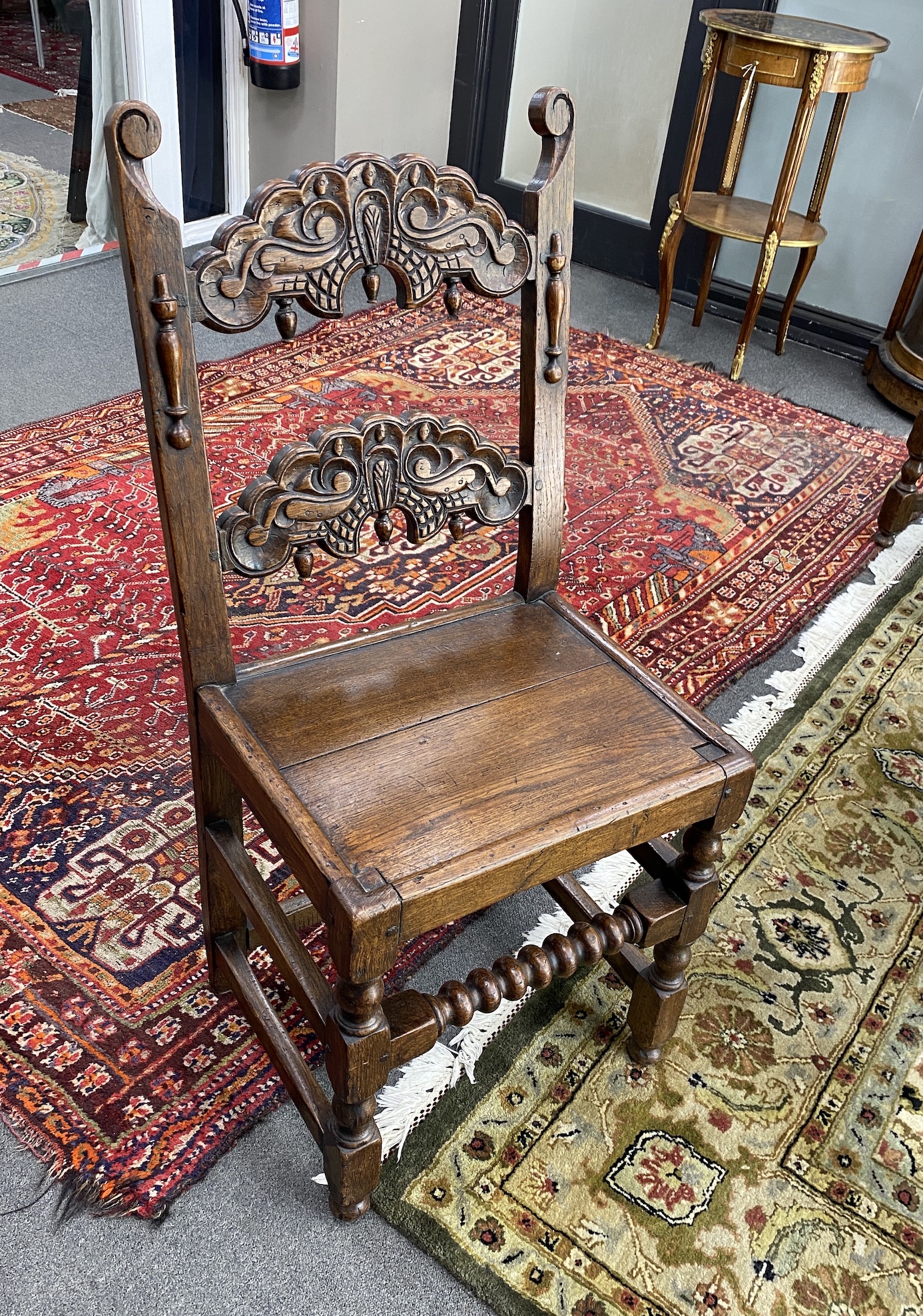 An 18th century and later rectangular oak refectory dining table, length 194cm, width 83cm, height 79cm and two Derbyshire style oak chairs
